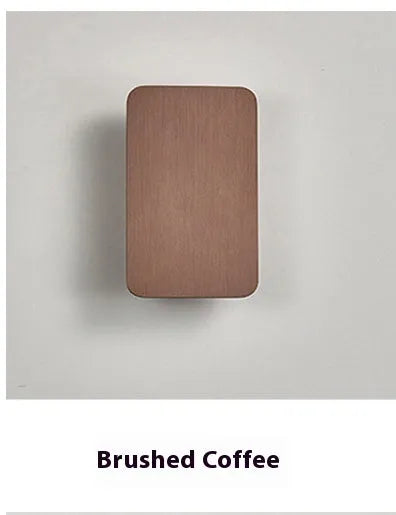Slim minimalist Nordic-style LED wall lamp mounted on a wall, shown in a choice of colours and sizes.