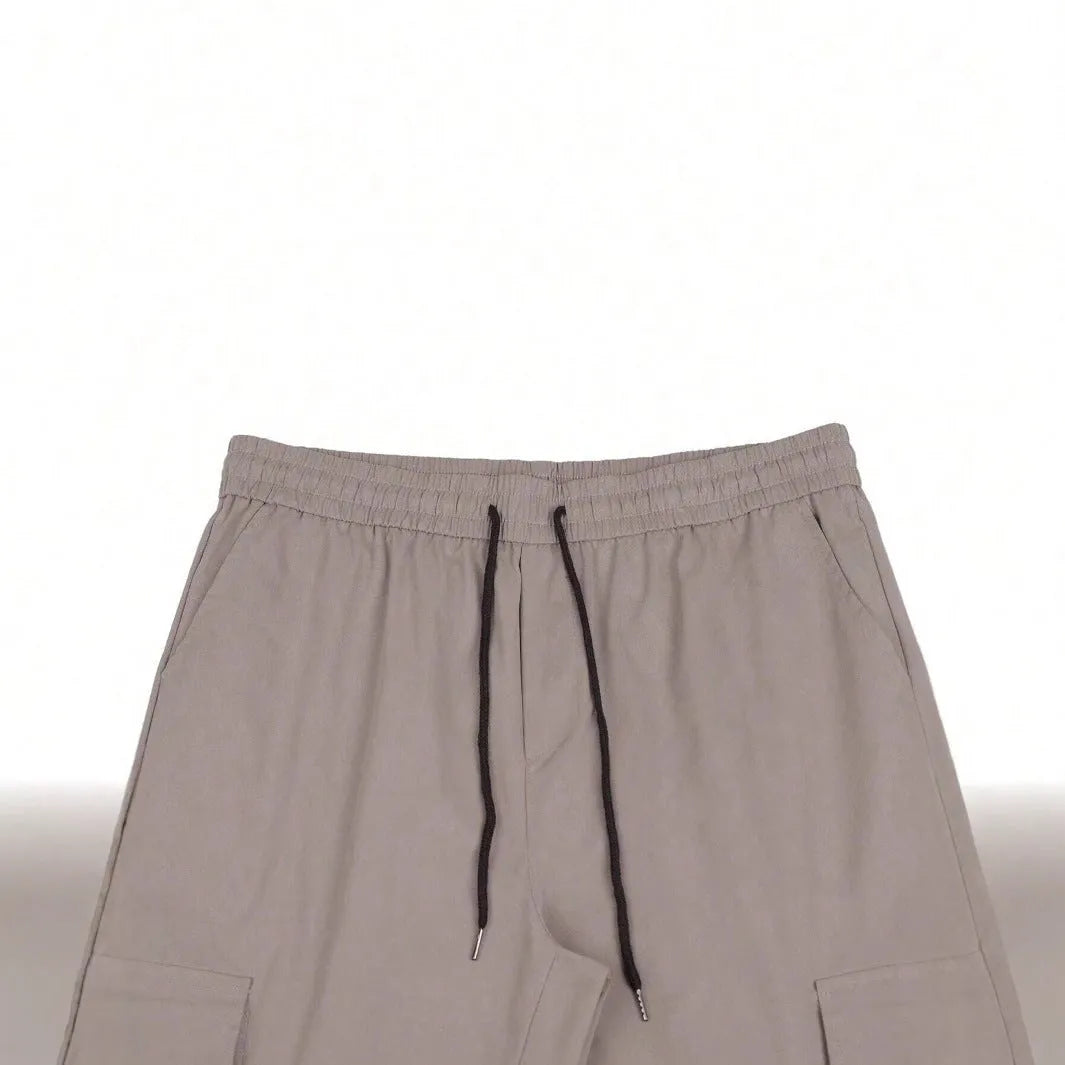 Workwear casual pants with drawstring elastic waist, solid colour, polyester fibre, skinny leg, black colour option