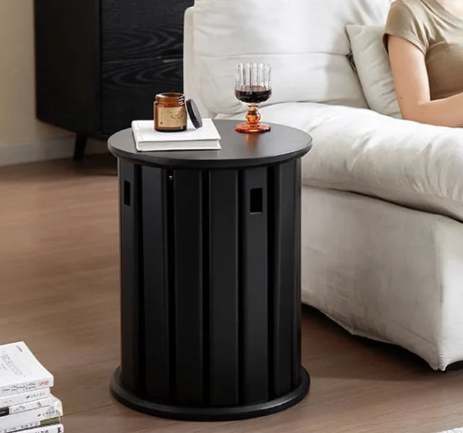 Stackable round iron dining stool in a modern style, shown in a choice of colours.