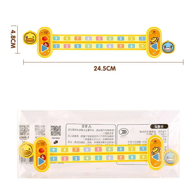 Yellow plastic decomposition ruler for children showing measurement scale and number markings