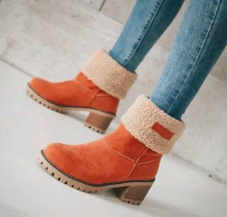 Women's suede mid-tube snow boots in black with a thick low heel and beef tendon sole.