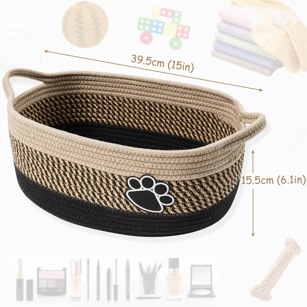 Light beige handmade cotton rope storage basket with a handle on a wooden floor.