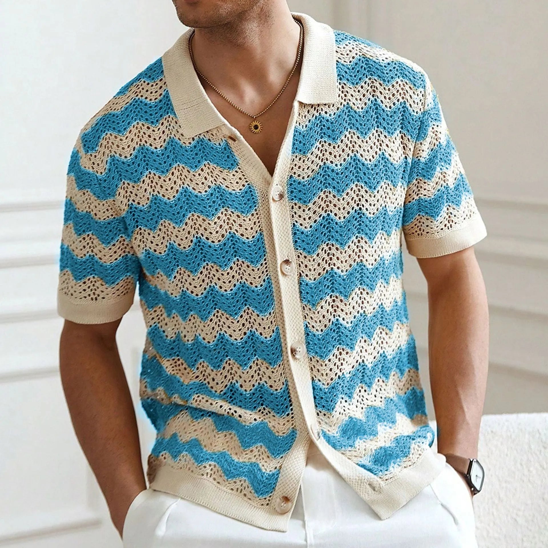 Short-sleeved yellow corrugated sweater with a hollow jacquard texture on a hanger.