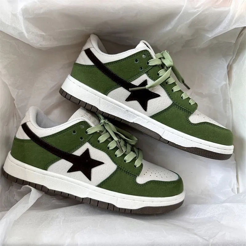 Women's retro style lace-up board shoes in green with rubber sole and round toe, flat heel