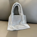 Shiny rhinestone handbag in silver colour, cotton thread construction, open pocket design for evening parties