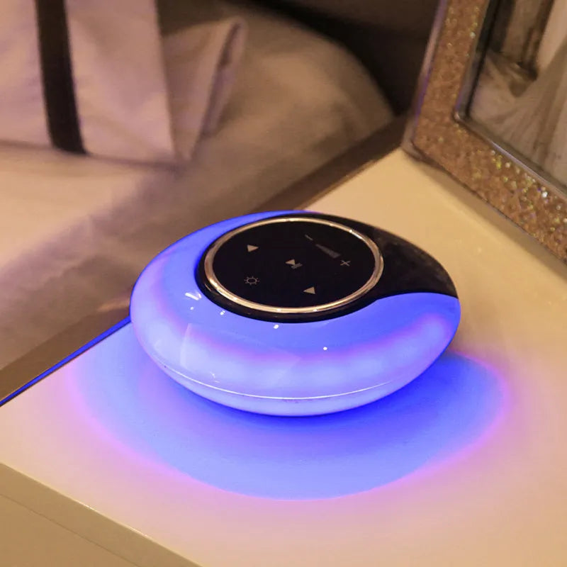 Bluetooth desk lamp with speaker showing folding design, touch controls, and LED lighting in plastic housing