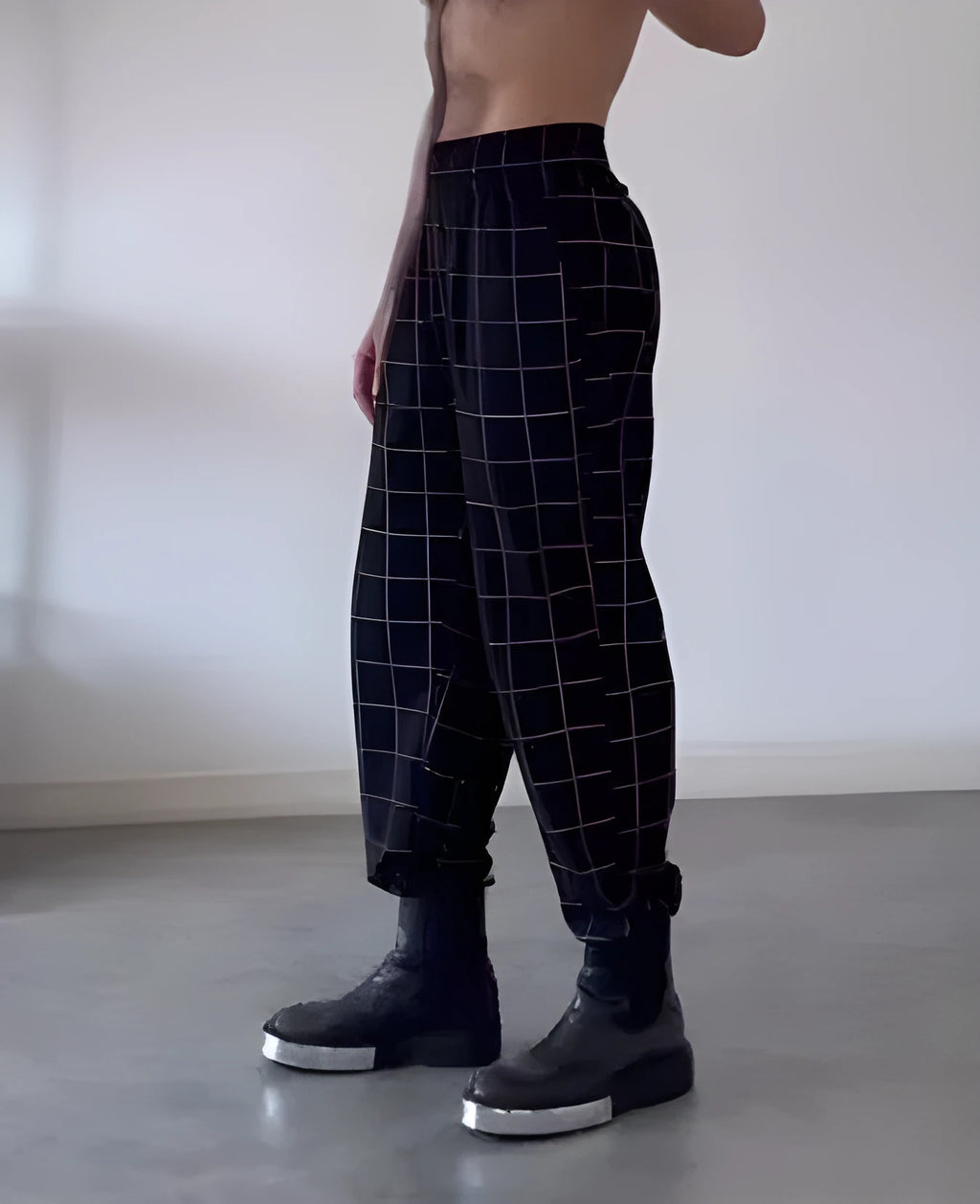 Men's plaid trousers with apron front detailing in cotton fabric, available in multiple sizes