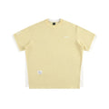 Retro alphabet embroidered loose waffle knit t-shirt in a fake two-piece style, shown in navy blue.