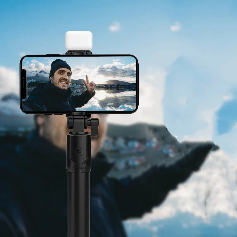 Aluminium alloy Bluetooth selfie stick with tripod and phone holder for Apple iPhones in black, pink, green, or white