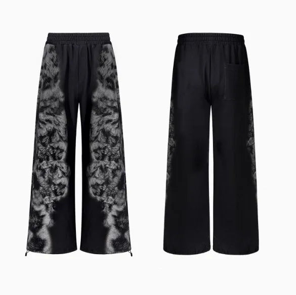 Loose fit streetwear co-ord set showing shorts, trousers, and hoodie with collage stitching detail