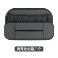Black leather car seat back storage bag with organisable pockets for vehicle use.