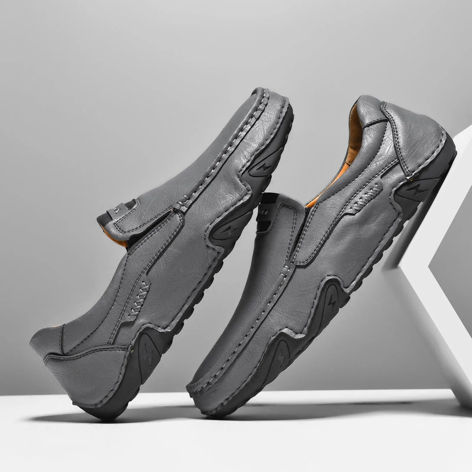 Men's casual slip-on shoes with flat rubber sole and microfiber upper in four colour options