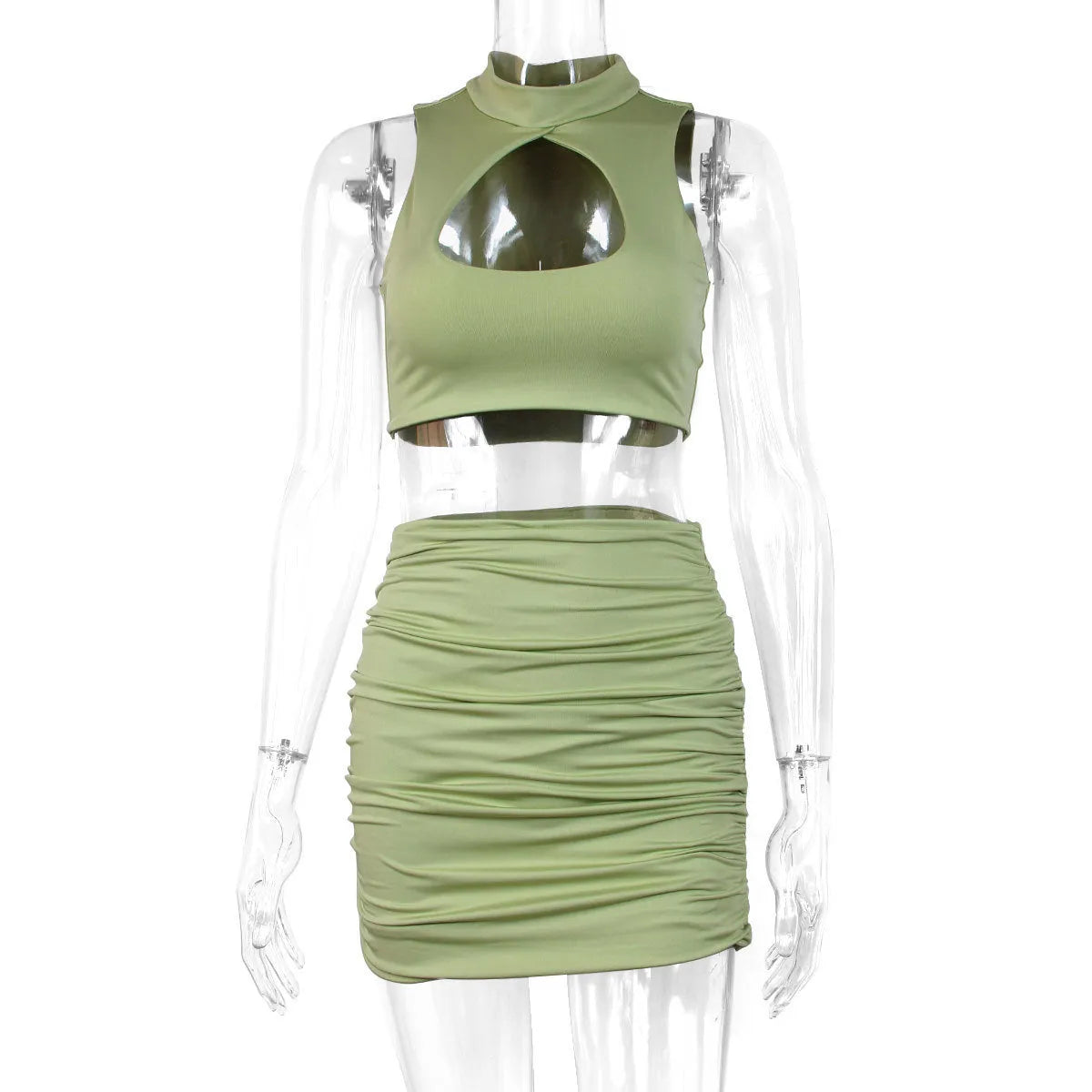 Light purple women's two-piece set with cutout vest and split hip skirt on a model.