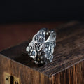 Silver open ring with detailed Jibeast pattern showing animal and zodiac modelling in retro style