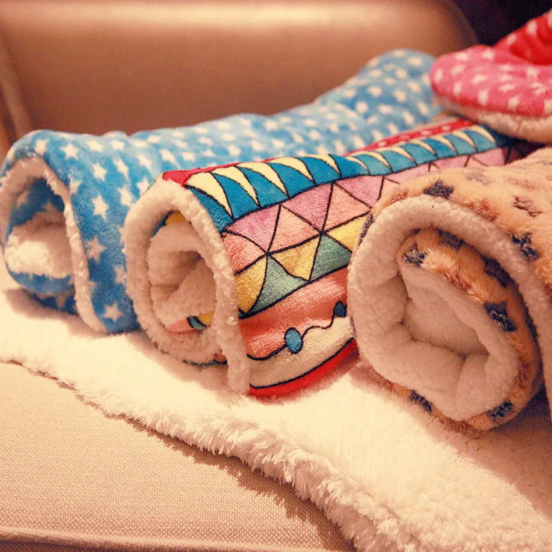 Coral cashmere pet blanket mat with reactive printing, showing a starry sky pattern on a 50x40cm size