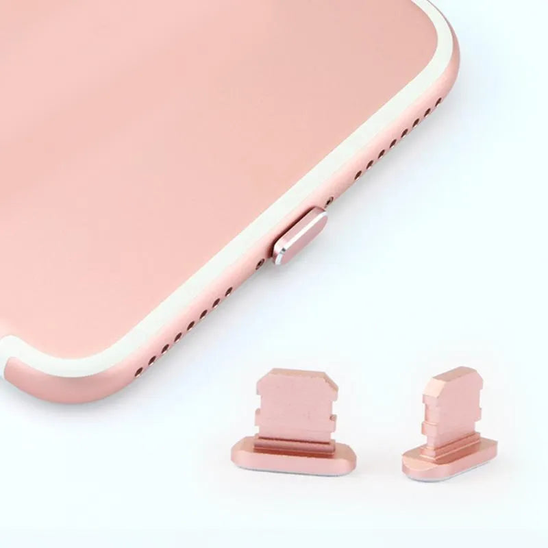 Aluminium alloy dust plug for iPhone charging port in various colours including gold, silver, blue, and rose gold.