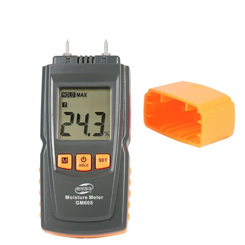 GM605 pin type wood moisture meter with black plastic casing and backlit LCD display