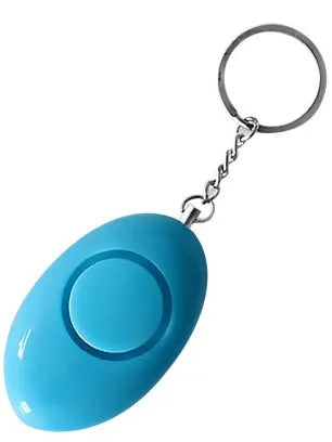Egg-shaped personal safety alarm keychain in pink with metal pin on a white background