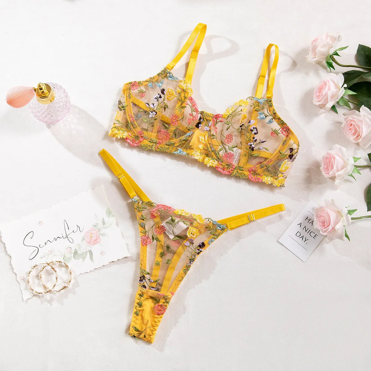 Floral patterned mesh bra and T-back underwear set in a skin colour, showing steel ring detail.