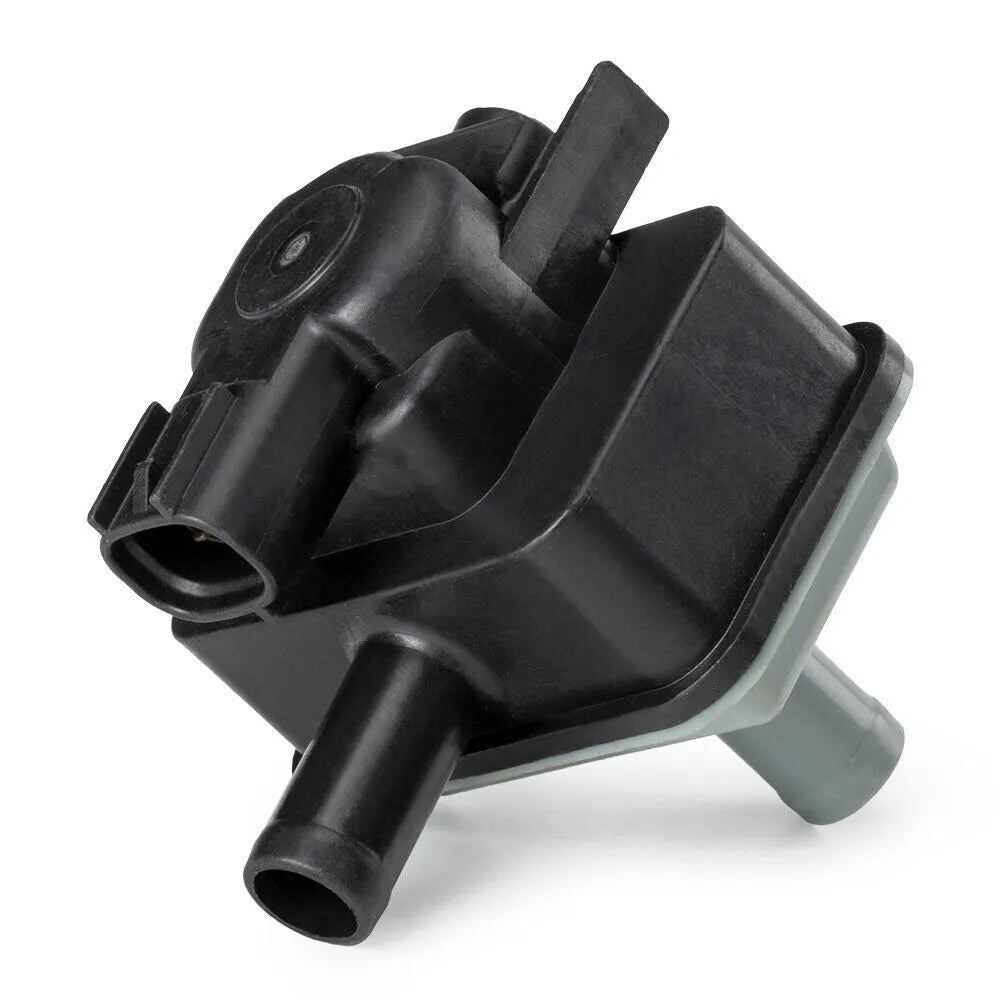 Toyota vacuum solenoid valve part number 90910-12283, a black electromagnetic component.