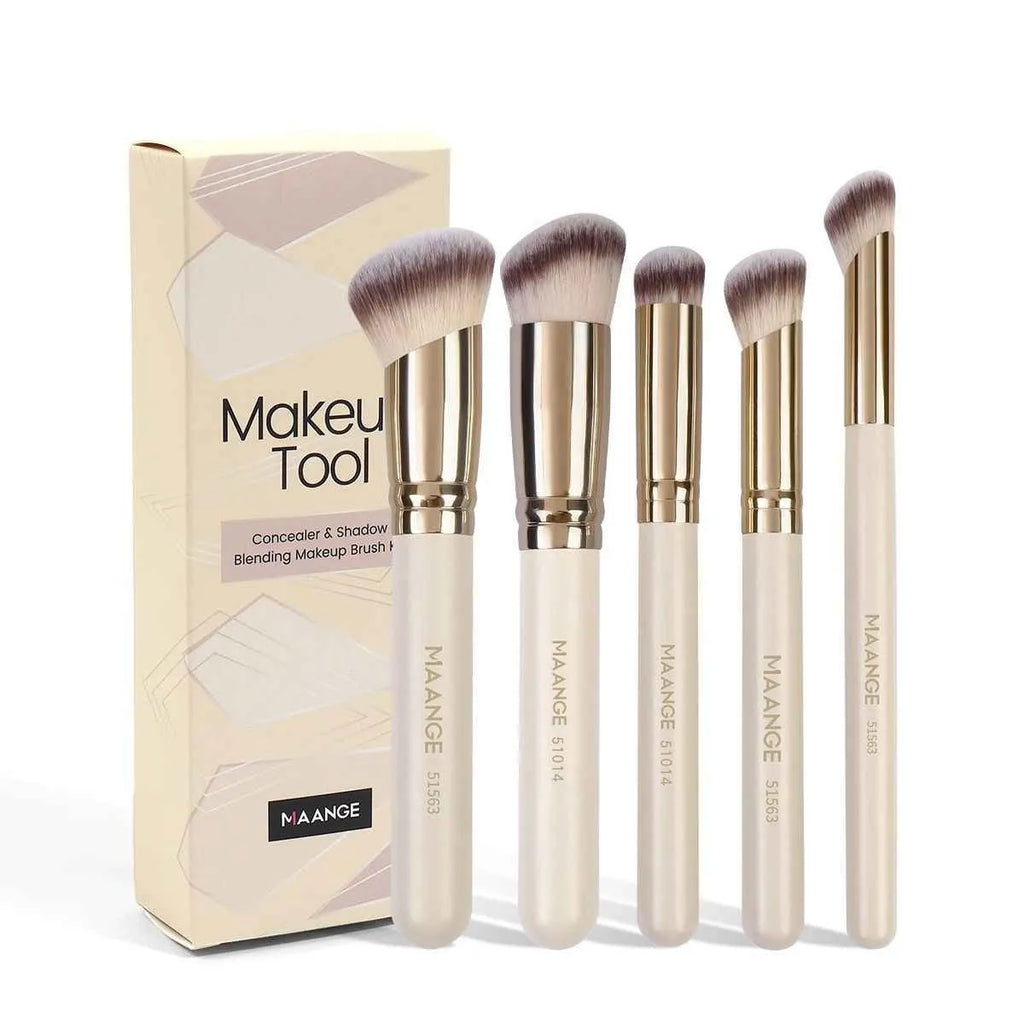 Five apricot coloured makeup brushes including angled blush brush for contouring