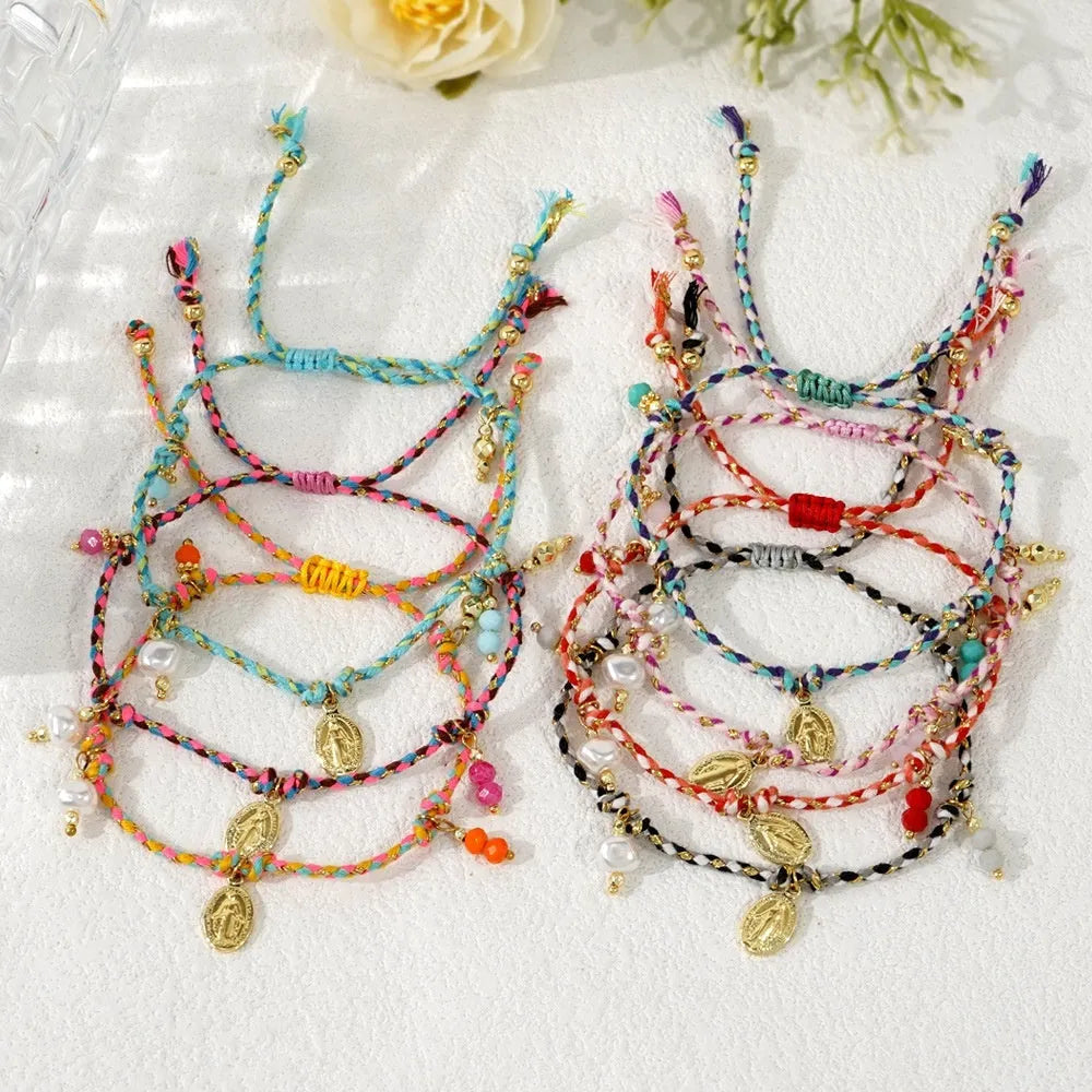 Close-up of a hand-woven colourful braided rope bracelet for women, showing textured ethnic style.