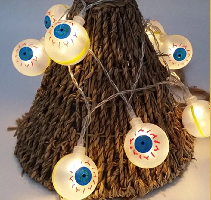 Halloween LED string lights with pumpkin, bat and ghost decorations showing colour changing illumination