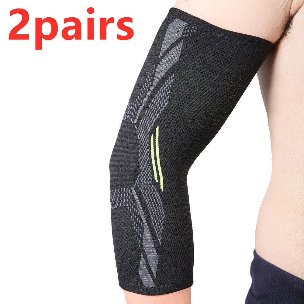 Black elbow support compression sleeve with anti-slip knitted design on a person's arm.