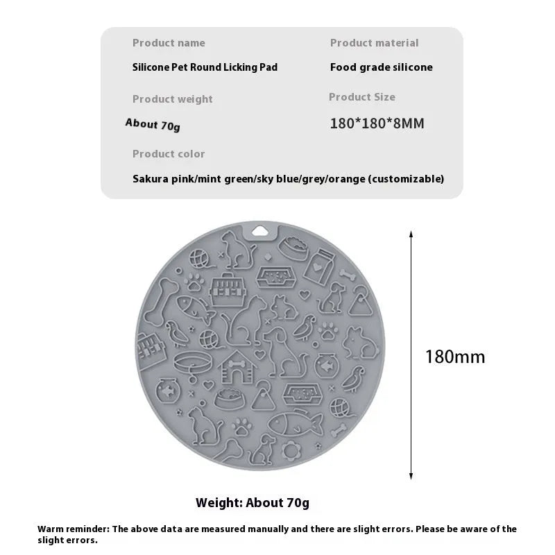 Round grey silicone pet lick mat with textured surface and a clear suction cup on its base.