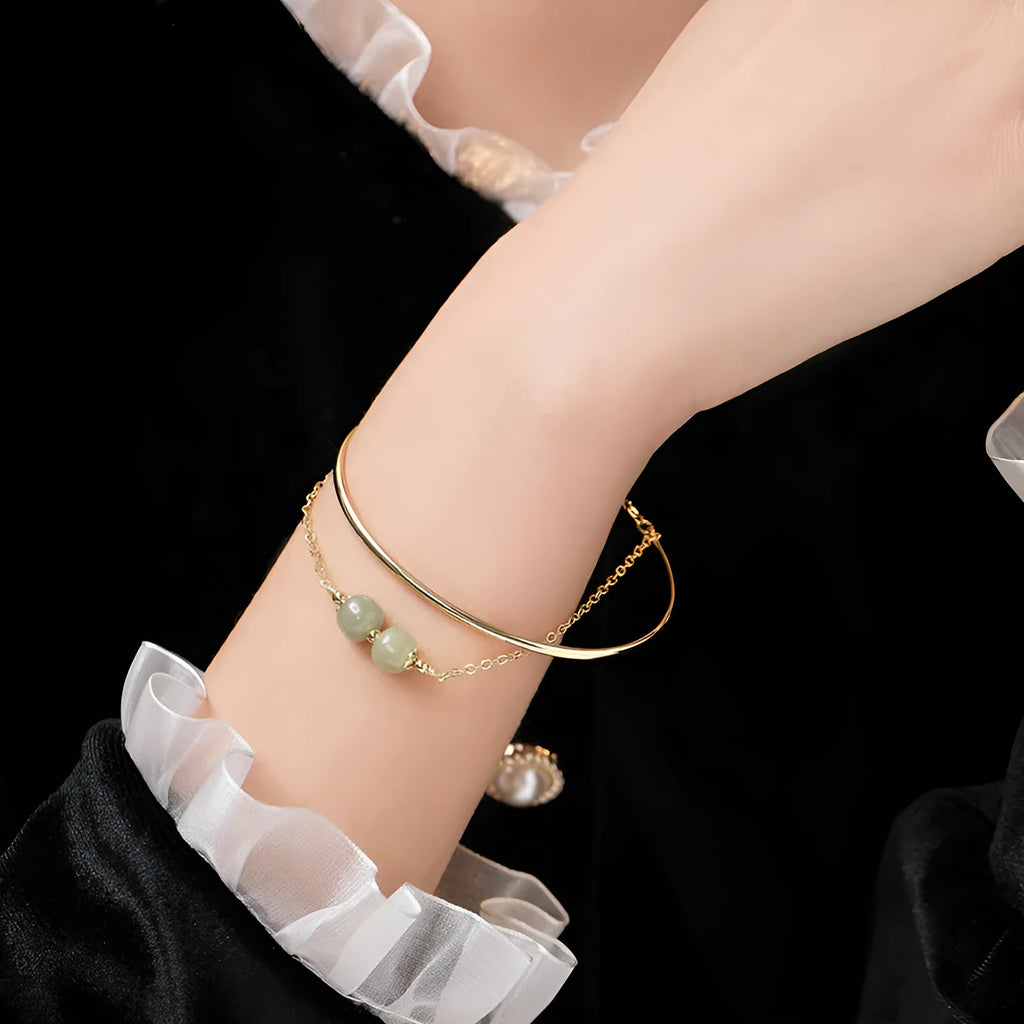 Women's Hetian jade lucky beads bracelet with gold inlay, showing single, double, and three bead style options.
