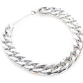 Gold coloured chain dog collar with twisted geometric pattern and buckle on small dog