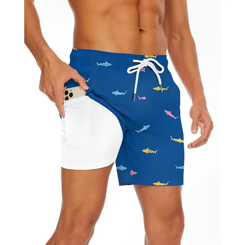 Man wearing loose light blue polyester beach pants with elastic waistband on a summer day.