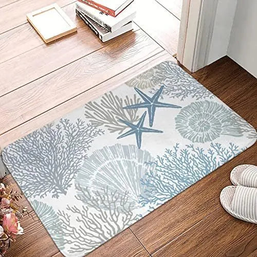 Soft square flannel floor mat with a coastal starfish print on a hard floor