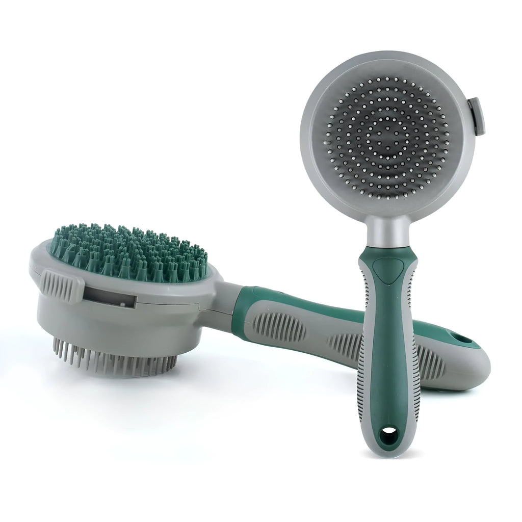 Green and pink dual-sided pet grooming brush showing slicker brush and silicone massager sides.