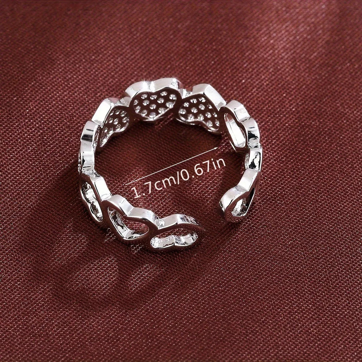 Adjustable geometric love heart couples ring in gold colour on small finger