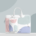 Blue PU leather laptop bag for a 15.6-inch notebook with a soft handle and zipper.