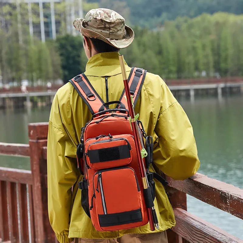 Large orange and black outdoor backpack with 20-35 litre capacity for hiking and camping