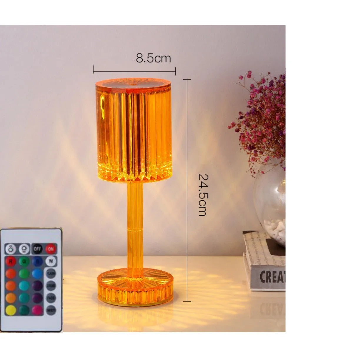 Amber K9 crystal table lamp with double-layered lampshade on a modern bedside table, warm LED light on medium brightness