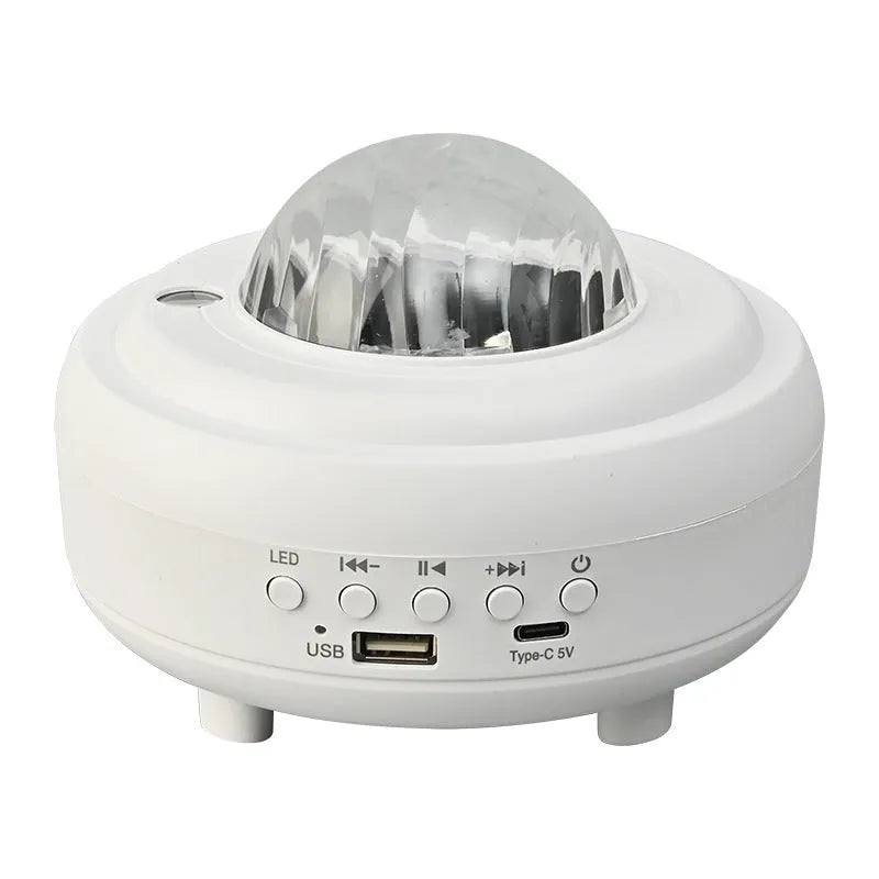 White Galaxy Star Projector Night Light showing star projection on wall next to a smartphone