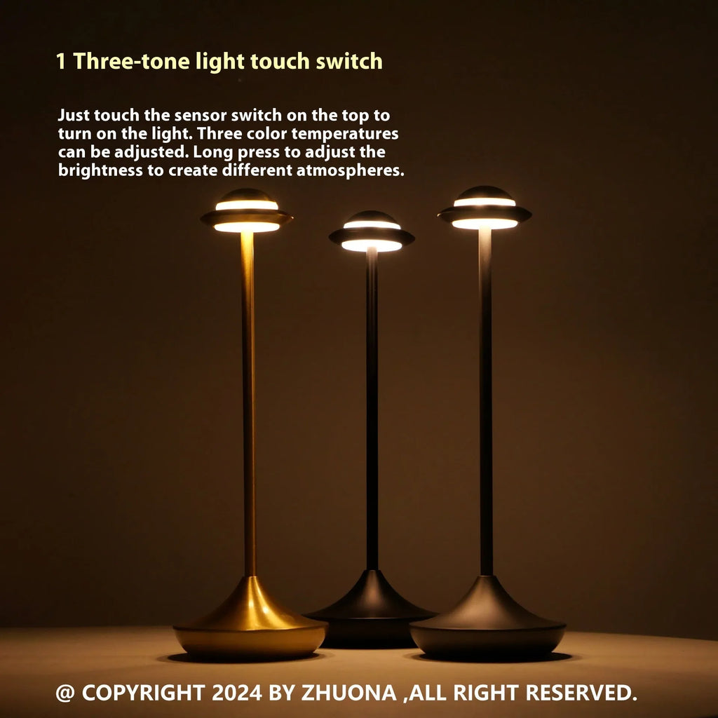 UFO-shaped rechargeable desk lamp with metal base and touch dimming in black, gold or grey