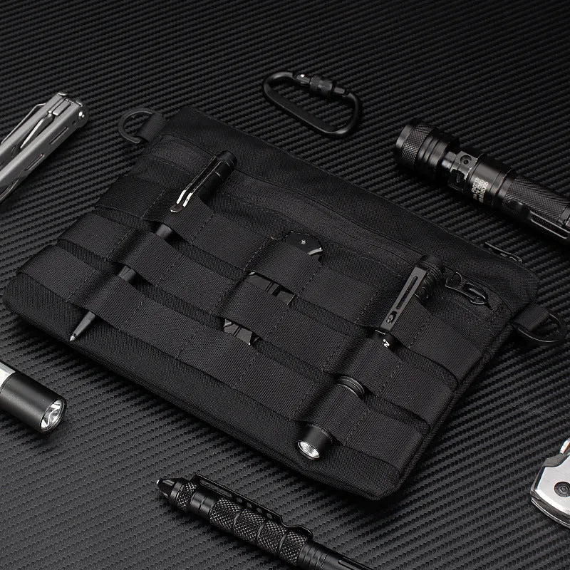 Black Oxford cloth portable outdoor kit measuring 18 by 3.5 centimetres