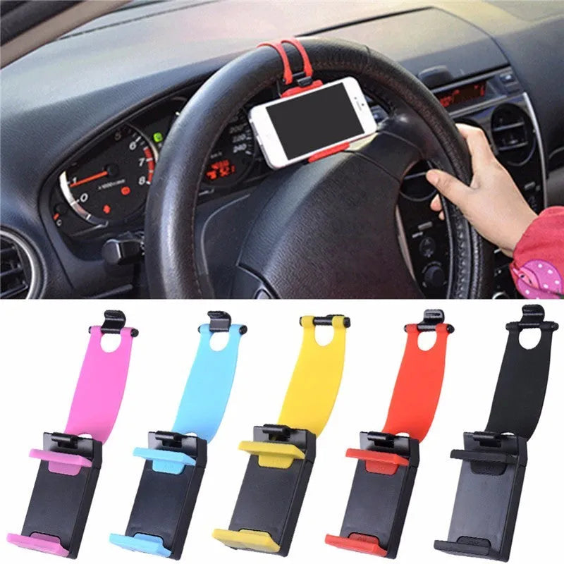 Black universal steering wheel phone holder clip mounted on a car steering wheel with a smartphone secured.
