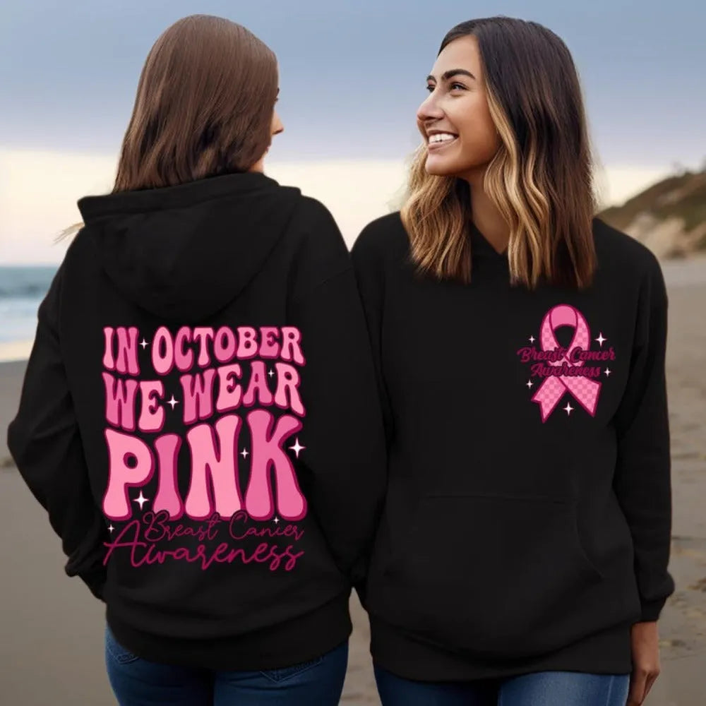 Women's pink Breast Cancer Awareness pullover hoodie with retro hot stamp print and side seam pockets.