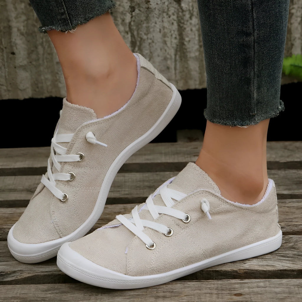 Women's creamy white fabric low-top casual sneakers with rubber sole