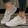 Women's creamy white fabric low-top casual sneakers with rubber sole