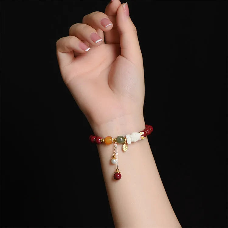 Natural beeswax purple gold sand bracelet with cinnabar rabbit motifs in national style