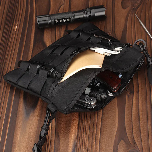 Black Oxford cloth portable outdoor kit measuring 18 by 3.5 centimetres