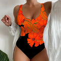 Women's one-piece swimsuit with 3D printed pattern in orange red, sky blue, or purple.