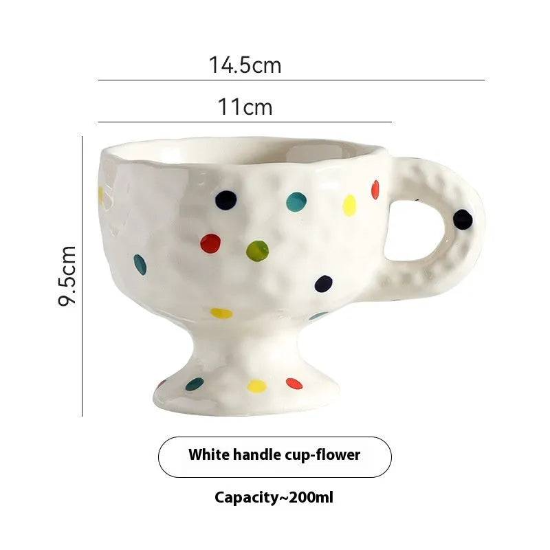Hand-pinched irregular ceramic mug in solid colour, approximately 250ml capacity