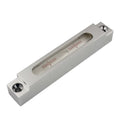 Mini metal and glass spirit level showing dual accuracy scales for precise measurement